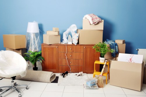 Man and van loading furniture for a local move in Isle of Dogs