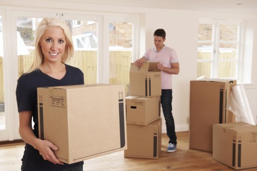 Removal team planning a move in a modern Isle of Dogs apartment building
