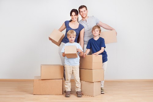 Careful box labeling and unpacking in a modern Canary Wharf area flat