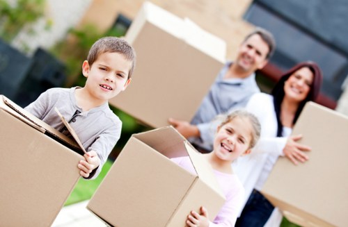 Local moving van loading furniture in Isle of Dogs
