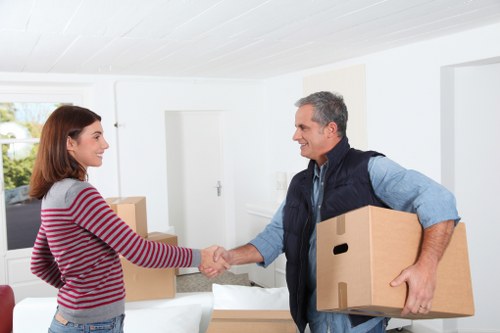 Careful packing and loading in a riverside East London apartment