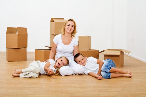 Packed boxes and furniture ready for local removal services in Isle of Dogs
