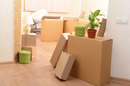 Furniture and boxes being prepared for a man and van removal