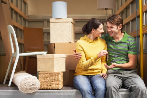 Professional movers handling loading access for an Isle of Dogs apartment